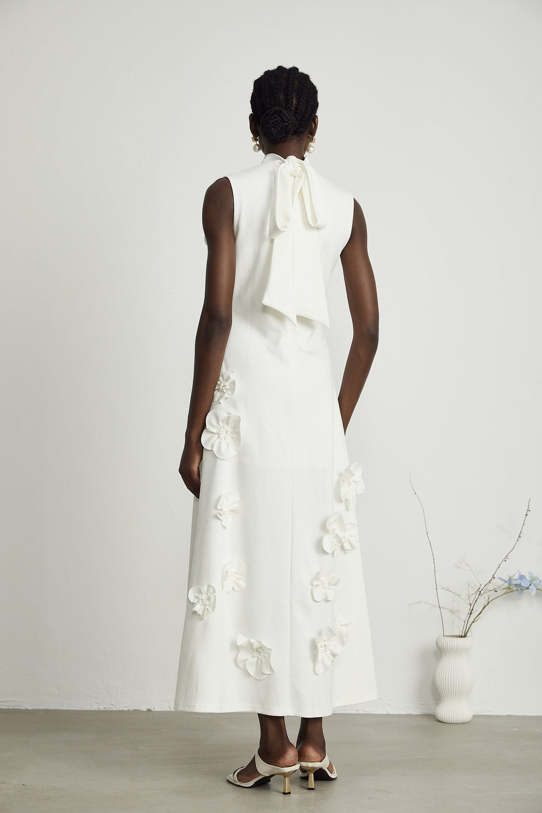 MAGALI BOW-TIE FAUX-FLOWER EMBELLISHED SLEEVELESS MAXI DRESS IN WHITE