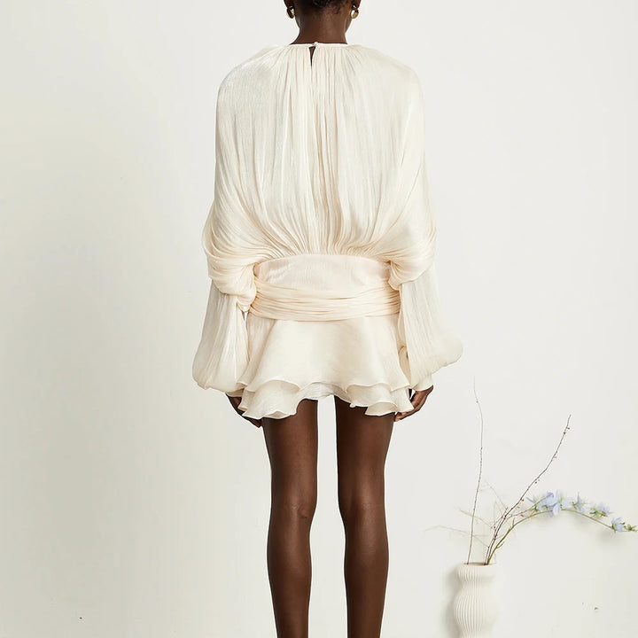 FULLY-PLEATED RUFFLED MINI DRESS IN NEUTRALS